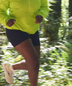 a runner experiencing the energy of WYLD Kiwi Gummies