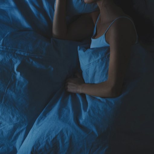 female sleeping after having WYLD Elderberry Gummies