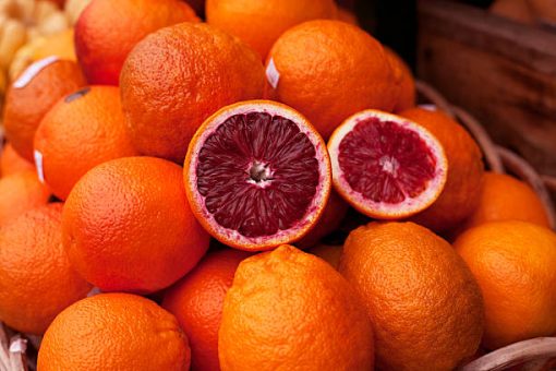 fresh blood orange fruits used in the production of WYLD Blood Orange Gummies
